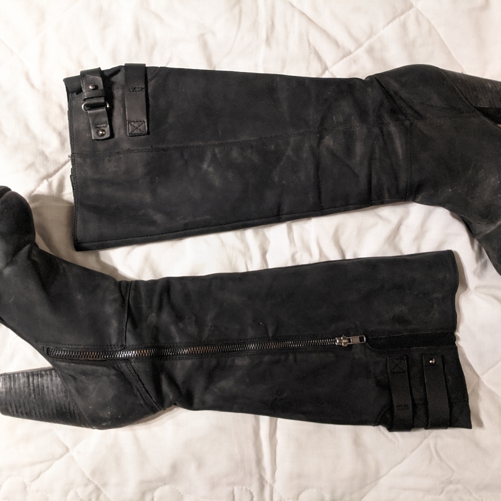 Knee high black leather boots